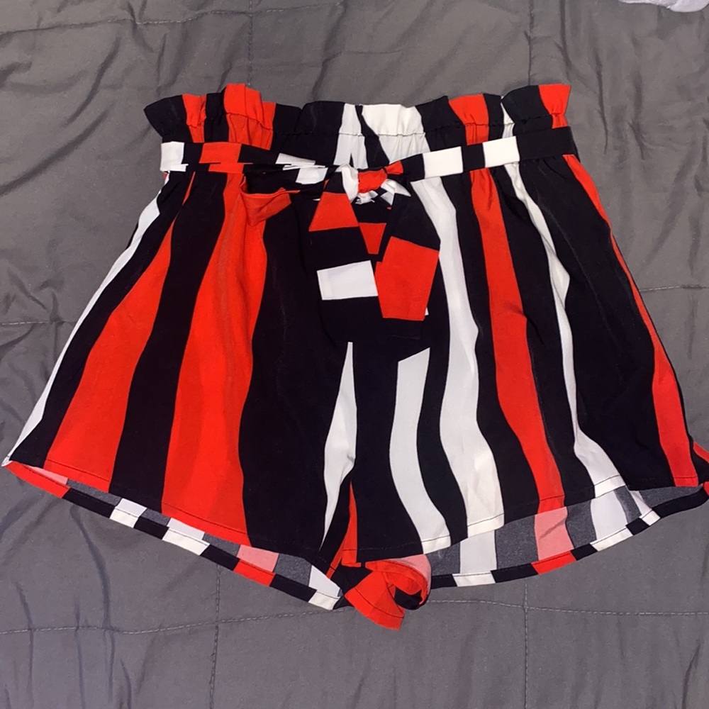 Red, black and white striped shorts